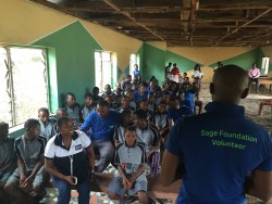 Magnus Nmonwu, Regional Director for Sage West Africa addressing kids and volunteers.JPG
